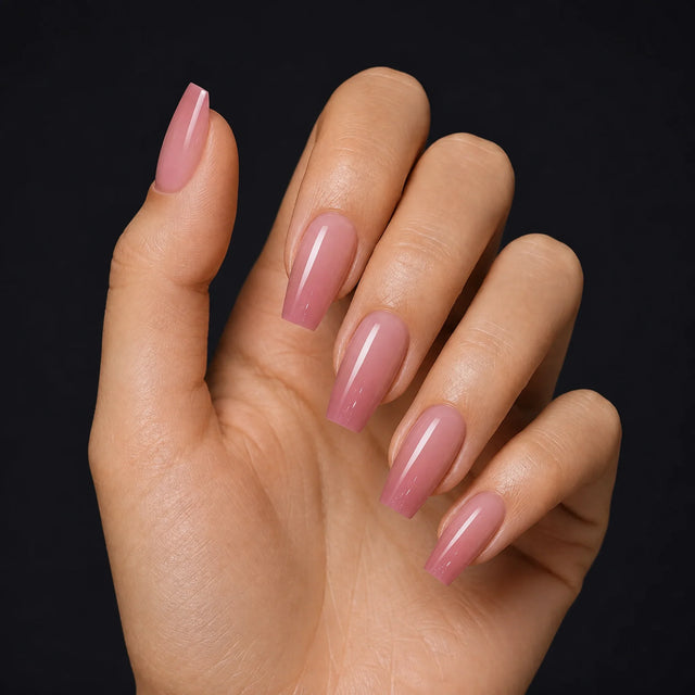 Gradient Press-On Nails, Almond Long — Hero — une main, fond noir